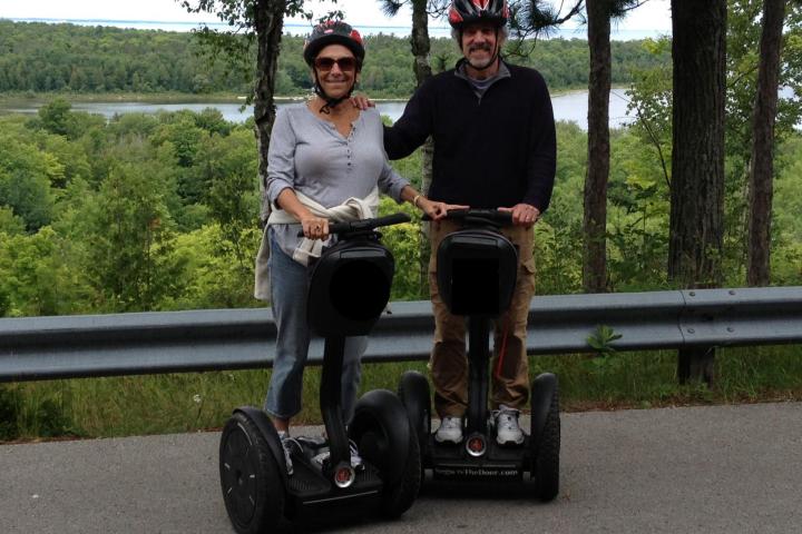 Older couple on Segways